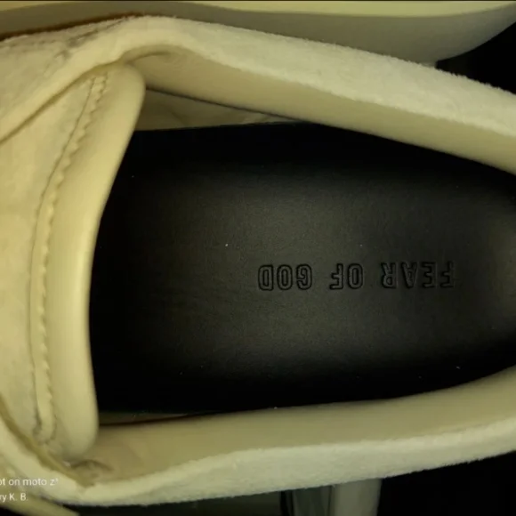 Fear of God Cream and Black Sneakers
